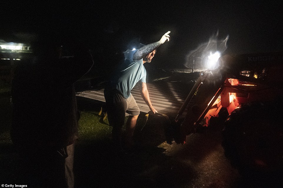 Louisiana Governor Bel Edwards warned residents to 'stay vigilant' over the weekend as 2,500 National Guard troops were drafted in to hard-hit areas