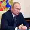 Skepticism Greets Putin's Announcement Of Russian Coronavirus Vaccine 