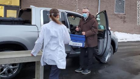 Doctor drives three hours to get Covid-19 vaccine to rural Michigan hospital
