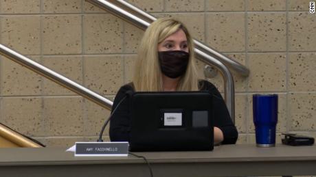 Amy Facchinello listens to students and parents expressing their views at a school board meeting last month.