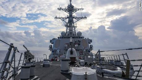 The guided-missile destroyer USS Benfold steams through the South China Sea on Monday, July 12.