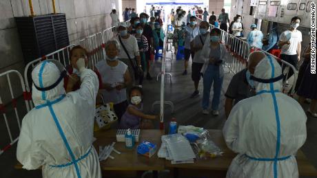Delta variant challenges China's zero Covid strategy — and raises questions over its vaccine efficacy