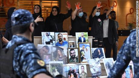 Relatives of the victims of Beirut Port blast gather in front of the house of Lebanon's Interior Minister, Mohammad Fahmi during a protest demanding the fair conduct of the investigation for the explosion in the Port of Beirut on Aug 4th in 2020, in Beirut, Lebanon on July 13, 2021.