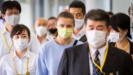 Kristina Timanovskaya at the Austrian Airlines boarding gate at Narita international airport on August 4.