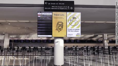 An information board in a deserted check-in hall at the Auckland Airport on July 7, 2020.