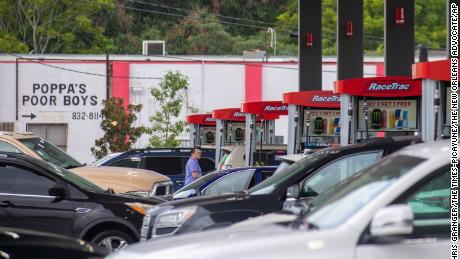 Long lines build at a gas station in Jefferson, Louisiana, as people prepare for the arrival of Hurricane Ida on Friday, Aug. 27, 2021.