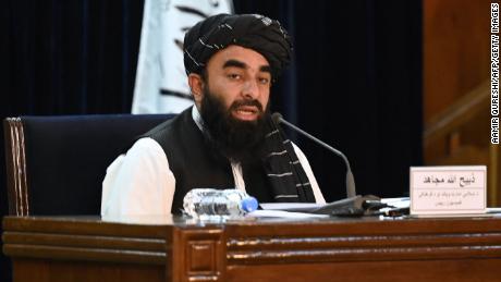 Taliban fighters use whips against Afghan women protesting the all-male interim government