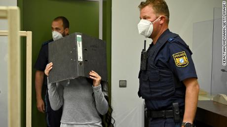 Jennifer W. arrives for her trial in Munich, Germany.