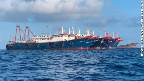 Analysis: Beijing has a navy it doesn't even admit exists, experts say. And it's swarming parts of the South China Sea