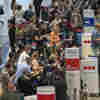 As omicron spreads, studies suggest that travel bans alone don't do much good
