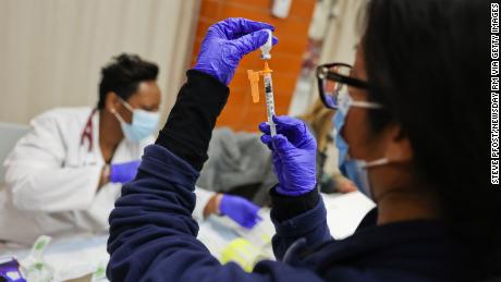 Is a fourth Covid-19 vaccine dose needed? US health officials say not yet