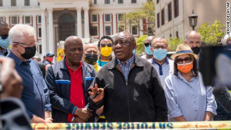 South African President Cyril Ramaphosa briefs reporters in Cape Town after visiting the scene of the fire on Sunday.