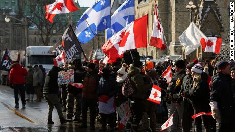 Protesters against Covid-19 vaccine mandates and restrictions are seen in front of Parliament on Saturday in Ottawa.