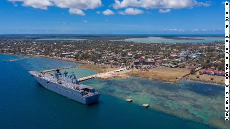 In this photo provided by the Australian Defence Force, HMAS Adelaide is docked at Nuku'alofa, Tonga, on January 27, after carrying disaster relief and humanitarian aid supplies.