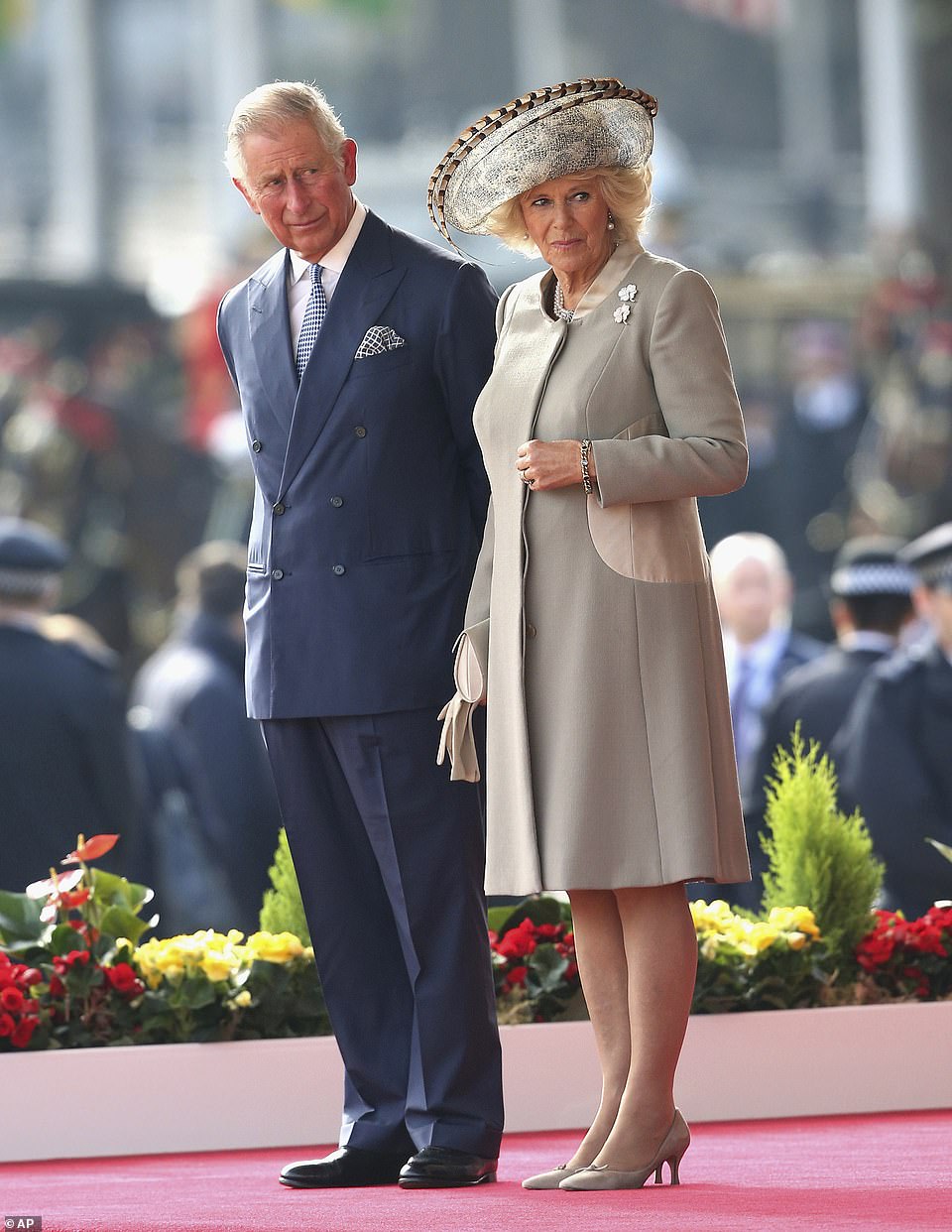 Charles and Camilla stand together during the official ceremonial welcome for the Chinese State Visit of Chinese President Xi Jinping and his wife Peng Liyuan to London in 2015