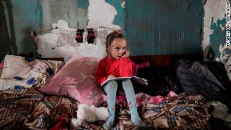 A young girl pictured in a shelter in Mariupol.