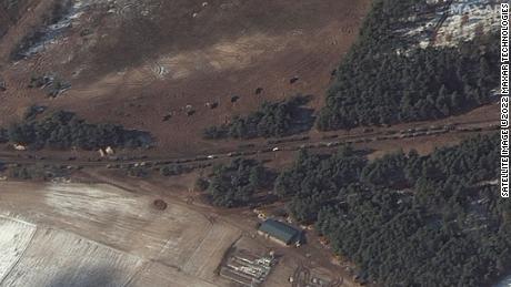 Several fuel trucks and what Maxar says appear to be multiple rocket launchers are seen positioned in a field in Berestyanka.