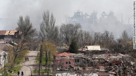 Smoke rises above the Azovstal plant as nearby buildings were flattened to the ground in Mariupol on April 18.
