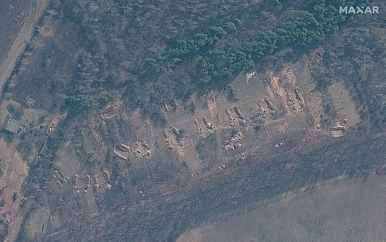 A satellite image shows an area where artillery batteries were seen previously.