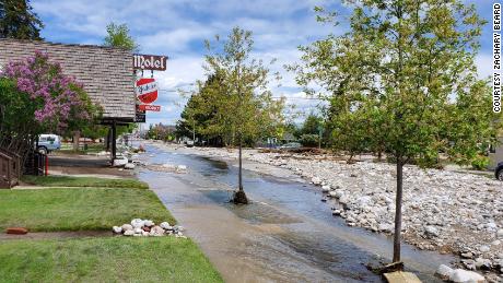 Photos taken on Tuesday afternoon show the aftermath of the flooding in Red Lodge, Montana. Images show the street covered in rocks and debris from the high water levels.