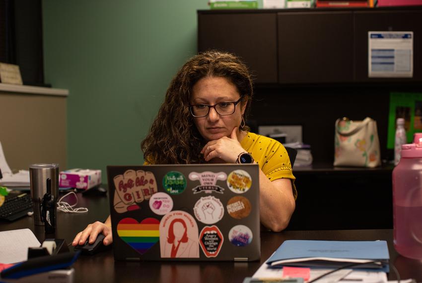 Andrea Gallegos speaks with a few of her employees after the Supreme Court overturned Roe v. Wade at the Alamo Women’s Repro…