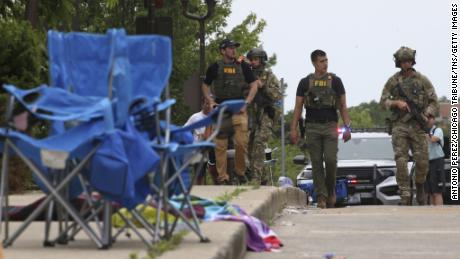 Highland Park shooter's rooftop position made it hard for police to find him quickly as parade turned into chaos, chief says