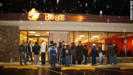 Loyal customers eagerly await the opening of Bob Crimo's deli in 2008.