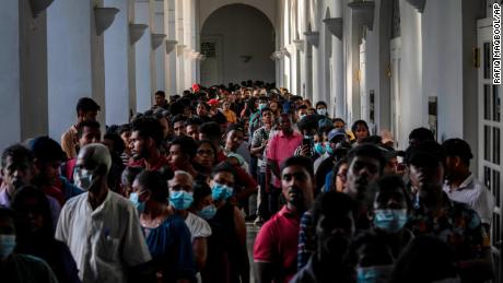 People throng President Gotabaya Rajapaksa's official residence three days after it was stormed by anti government protesters in Colombo, Sri Lanka, on July 12.