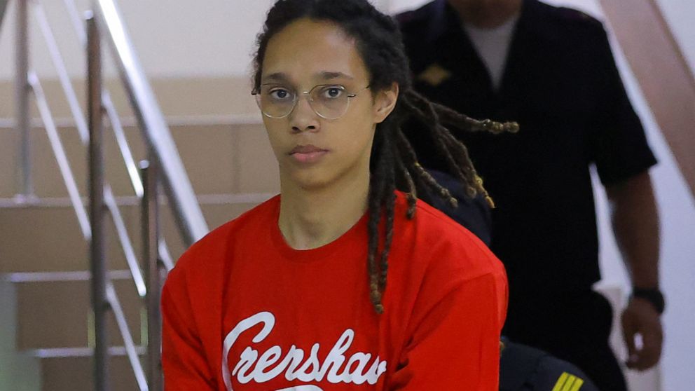 PHOTO: U.S. basketball player Brittney Griner, who was detained in March at Moscow's Sheremetyevo airport and later charged with illegal possession of cannabis, is escorted before a court hearing in Khimki, outside Moscow, Russia July 7, 2022. 