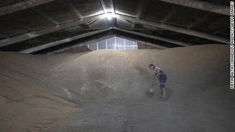 A Ukrainian farmer works at a warehouse in Odesa, southern Ukraine, in July.