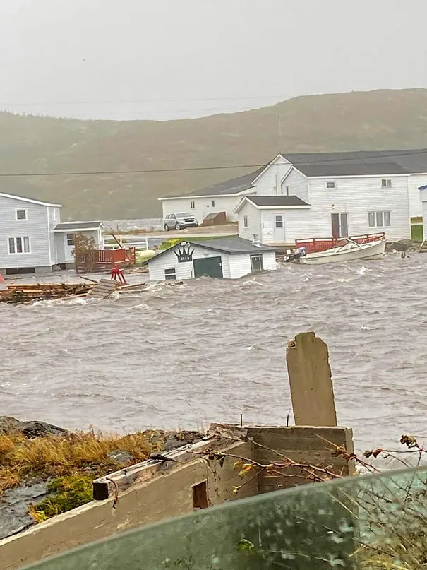This Sept. 24, 2022, image courtesy of Michael King, special advisor to Newfoundland and Labrador Premier Andrew Furey, and his family, shows damaged caused by post-tropical storm Fiona on the Burnt Islands, in the Newfoundland and Labrador Province of Canada. Fiona knocked out power to more than 500,000 households as it lashed eastern Canada with strong winds and heavy rain on Saturday, electricity providers said. In the province of Nova Scotia alone, at least 400,000 households lost electricity after Fiona, downgraded from a hurricane to a post-tropical storm but still packing winds of 137 kilometres per hour, made landfall, Nova Scotia Power reported.