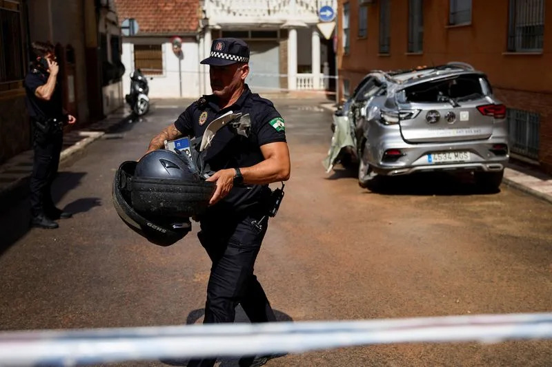 A vehicle sits wrecked after an earthquake of magnitude 5 struck southern Spain