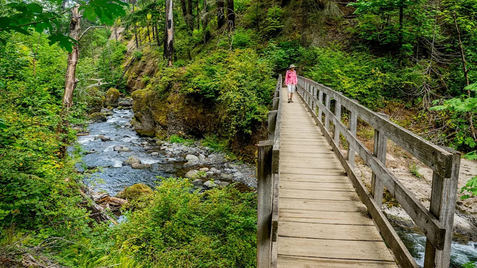 hiker on bridge