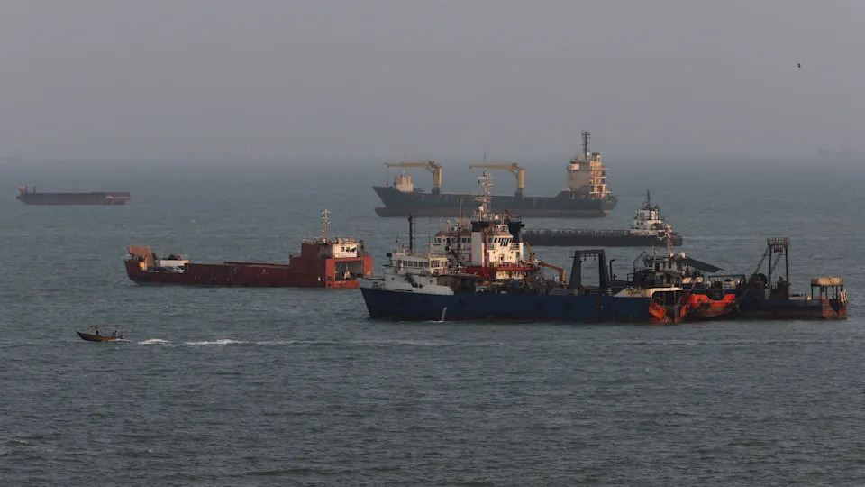 Ships are anchored in the Strait of Hormuz