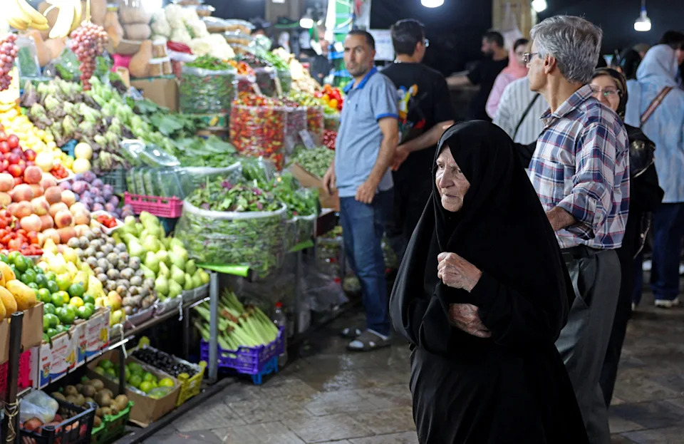 People shop for produce at Tajrish bazaar in northern Tehran.
