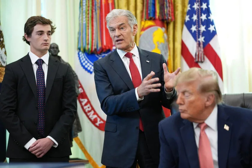 Dr. Mehmet Oz speaks in the Oval Office as President Trump and Nick Shirley listen